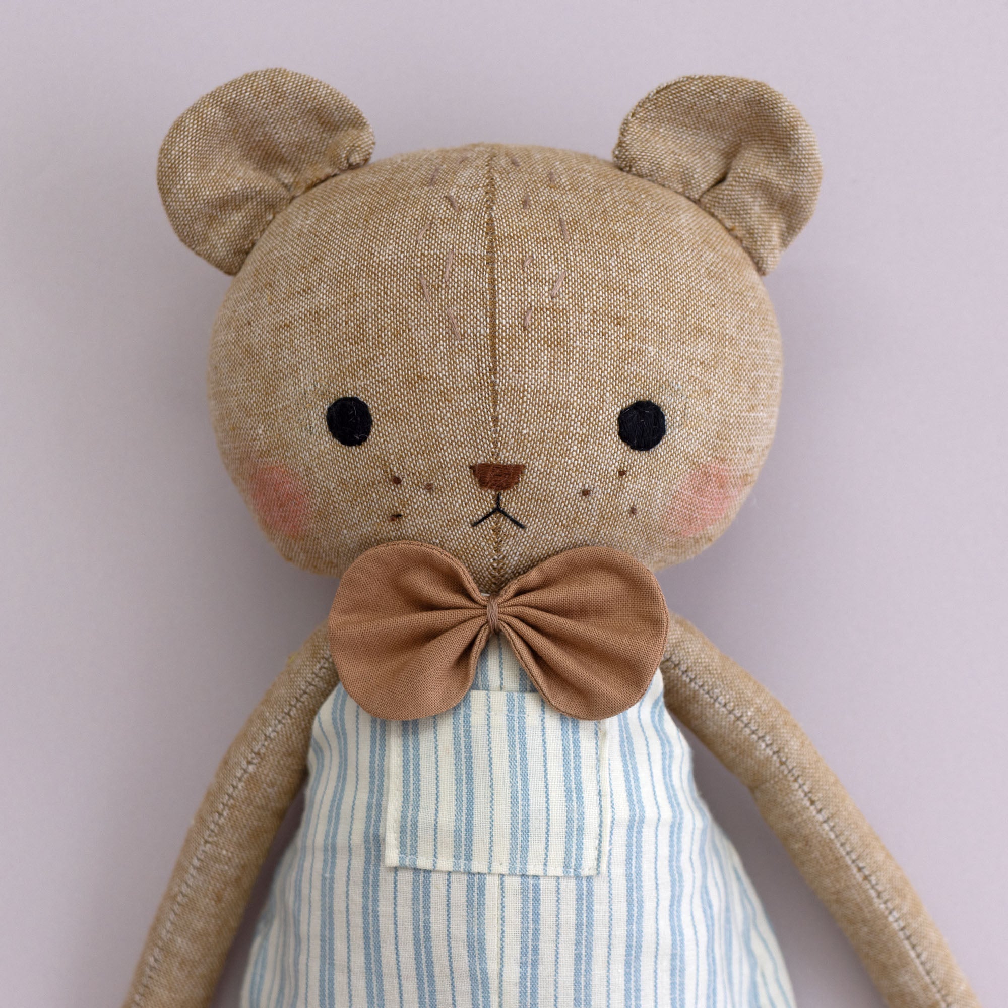 Sewing a sale teddy bear